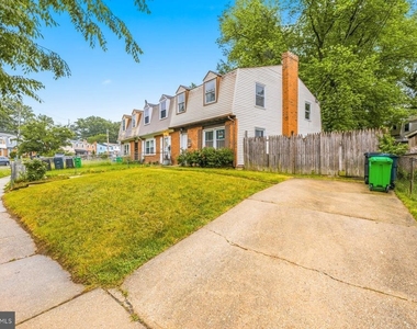 7711 Burnside Road - Photo Thumbnail 1