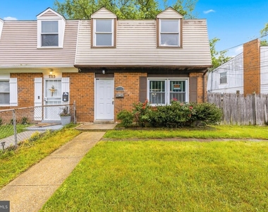 7711 Burnside Road - Photo Thumbnail 2