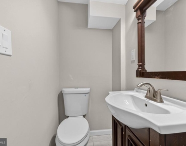 7711 Burnside Road - Photo Thumbnail 12