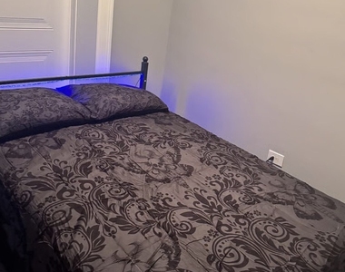 6500 S Rhodes Avenue - Photo Thumbnail 7