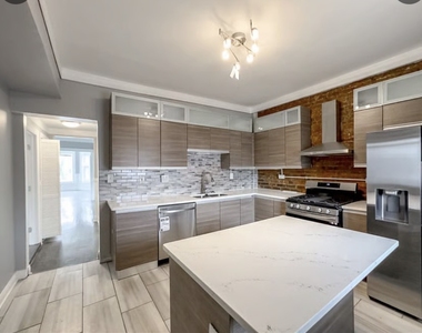 6500 S Rhodes Avenue - Photo Thumbnail 3