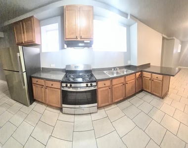 6030 S Eberhart Avenue - Photo Thumbnail 4