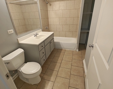 6030 S Eberhart Avenue - Photo Thumbnail 1