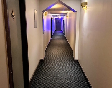 3933 N Clarendon Avenue - Photo Thumbnail 3