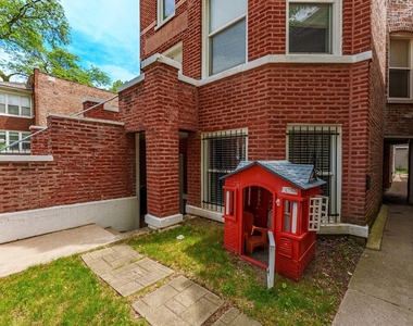 555 N Lawler Avenue - Photo Thumbnail 3