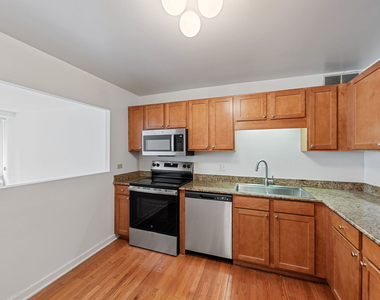 211 E Ohio Street - Photo Thumbnail 2