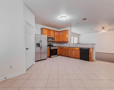 7434 Jacobs Well Drive - Photo Thumbnail 7