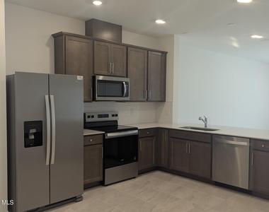 4317 Jetty Lane Ne - Photo Thumbnail 2
