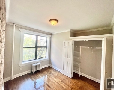 E 13th St. - Photo Thumbnail 3