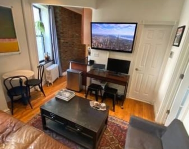 E 13th St. - Photo Thumbnail 2