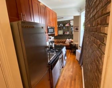 E 13th St. - Photo Thumbnail 3