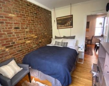 E 13th St. - Photo Thumbnail 5