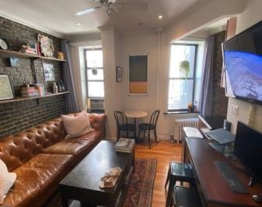E 13th St. - Photo Thumbnail 1