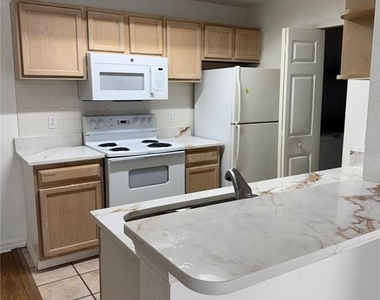 7630 Pissarro Drive - Photo Thumbnail 1