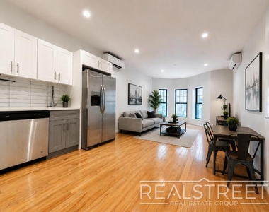 1440 Lincoln Place - Photo Thumbnail 1