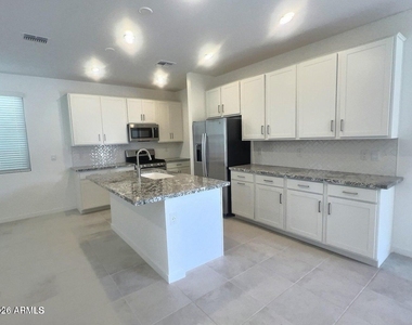 9861 E Tamery Avenue - Photo Thumbnail 2
