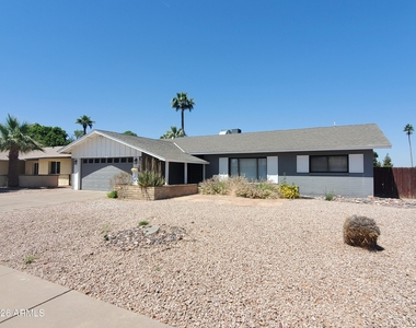 4404 S Rita Lane - Photo Thumbnail 1