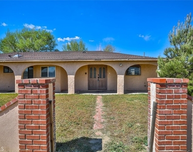 7033 W Avenue A2 - Photo Thumbnail 1