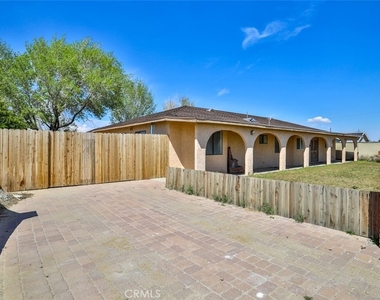7033 W Avenue A2 - Photo Thumbnail 3