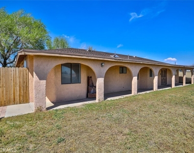 7033 W Avenue A2 - Photo Thumbnail 4