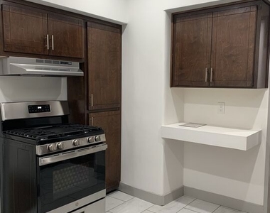 1416 W 46th Street - Photo Thumbnail 4