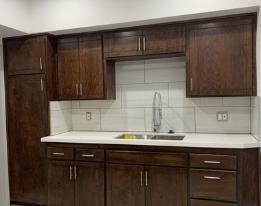 1416 W 46th Street - Photo Thumbnail 3