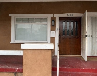 1416 W 46th Street - Photo Thumbnail 1