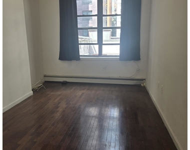 155 E 33rd St - Photo Thumbnail 1