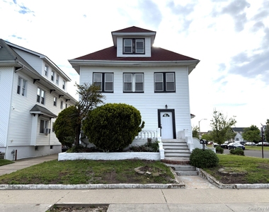 517 Laurelton Blvd - Photo Thumbnail 2