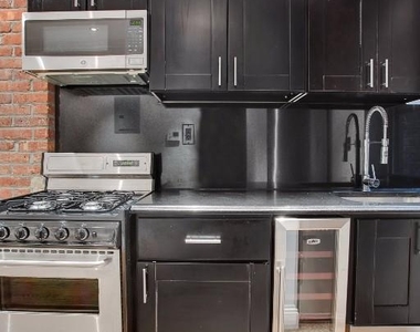 436 West 52nd Street - Photo Thumbnail 2