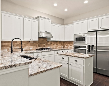 11704 Quintana Cv - Photo Thumbnail 1