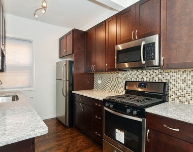 725 N Throop Street - Photo Thumbnail 2