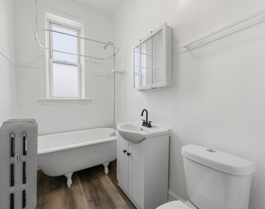 7000 S Paxton Avenue - Photo Thumbnail 5