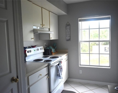 9078 Lake Chase Island Way - Photo Thumbnail 12