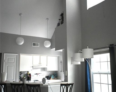 9078 Lake Chase Island Way - Photo Thumbnail 5