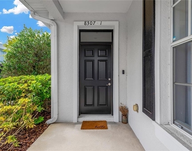 8307 Manor Club Circle - Photo Thumbnail 1
