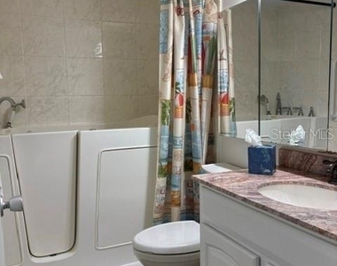 7920 Sun Island Drive S - Photo Thumbnail 14