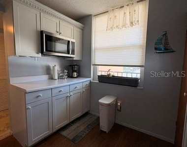 7920 Sun Island Drive S - Photo Thumbnail 3