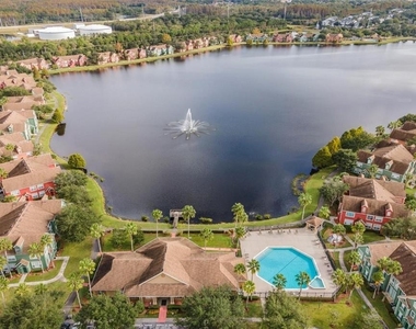 9156 Lake Chase Island Way - Photo Thumbnail 2