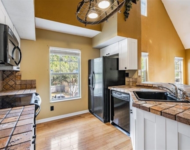 9156 Lake Chase Island Way - Photo Thumbnail 20