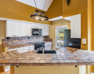 9156 Lake Chase Island Way - Photo Thumbnail 21