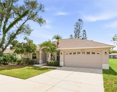 6141 36th Lane E - Photo Thumbnail 2
