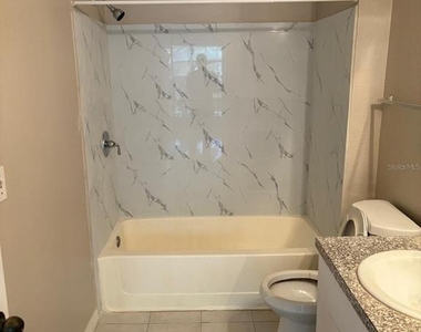 6336 Raleigh Street - Photo Thumbnail 9