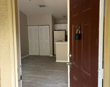 6336 Raleigh Street - Photo Thumbnail 1