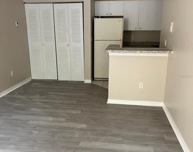 6336 Raleigh Street - Photo Thumbnail 3