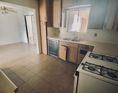 9406 Montgomery Drive - Photo Thumbnail 4