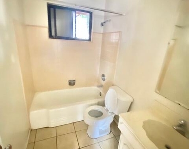 9406 Montgomery Drive - Photo Thumbnail 9