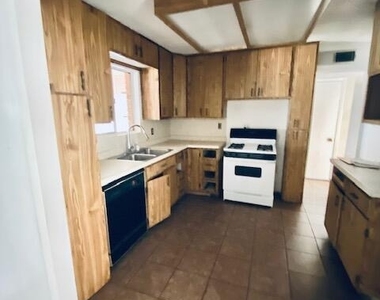 9406 Montgomery Drive - Photo Thumbnail 3