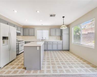 9888 Sparrow Ridge Avenue - Photo Thumbnail 13