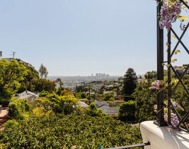 8706 Sunset Plaza Place - Photo Thumbnail 20